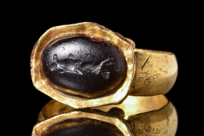 BYZANTINE GOLD RING WITH STONE INTAGLIO OF JONAH AND THE WHALE

 Ca. AD 600
 ...