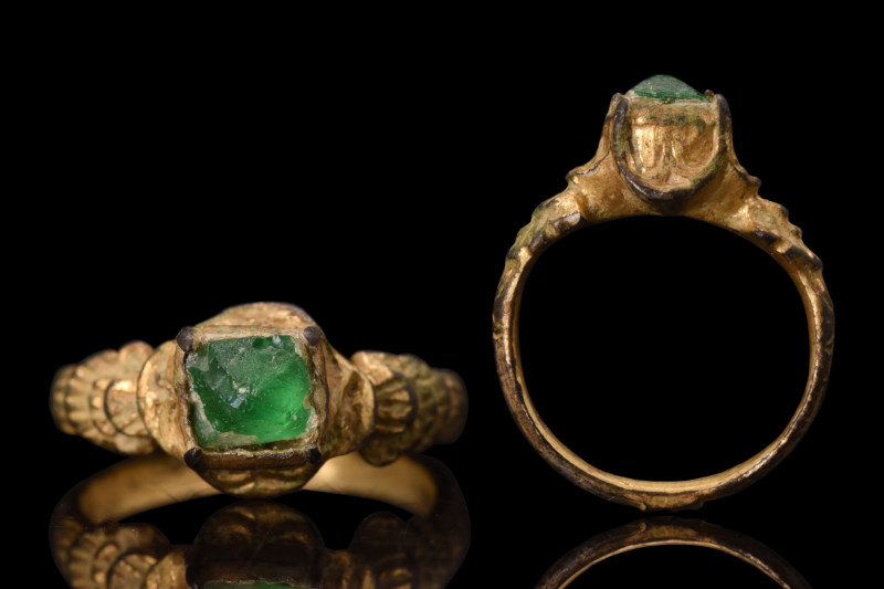 LATE MEDIEVAL GILT BRONZE RING WITH GEM 

 Ca. AD 1500
 A gilt-bronze finger ...