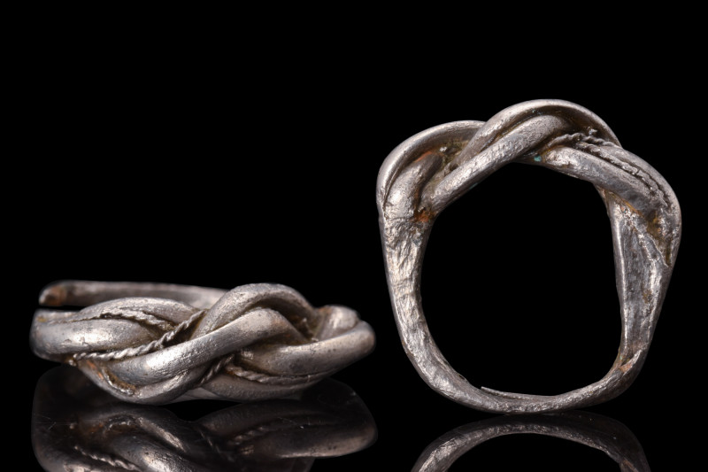 VIKING SILVER BRAIDED RING

 Ca. AD 900-1100
 A silver finger ring with flat ...