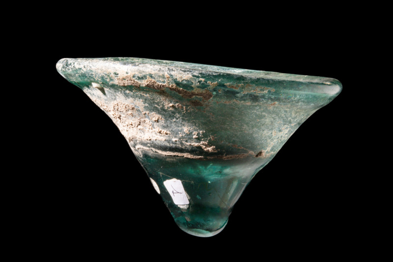 BYZANTINE GLASS OIL LAMP

 Ca. 5th-10th century AD
 A dark green glass oil la...