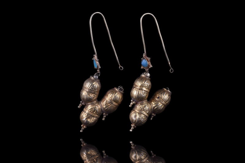 A MATCHED PAIR OF GOLD EARRINGS 

 Ca. 11th-12th century AD
 A matched pair o...