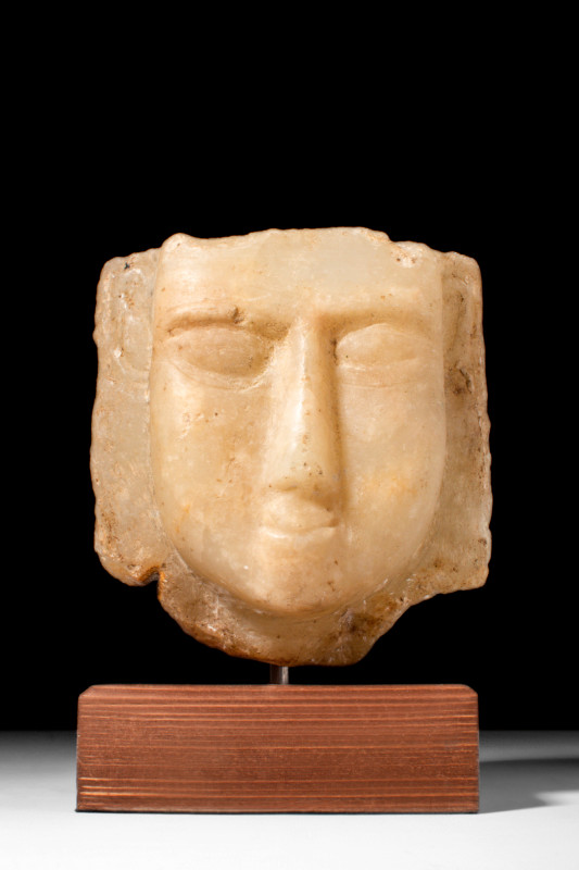 SOUTH ARABIAN ALABASTER FACE STELE

 Ca. 200 BC - AD 100
 A hand-carved alaba...