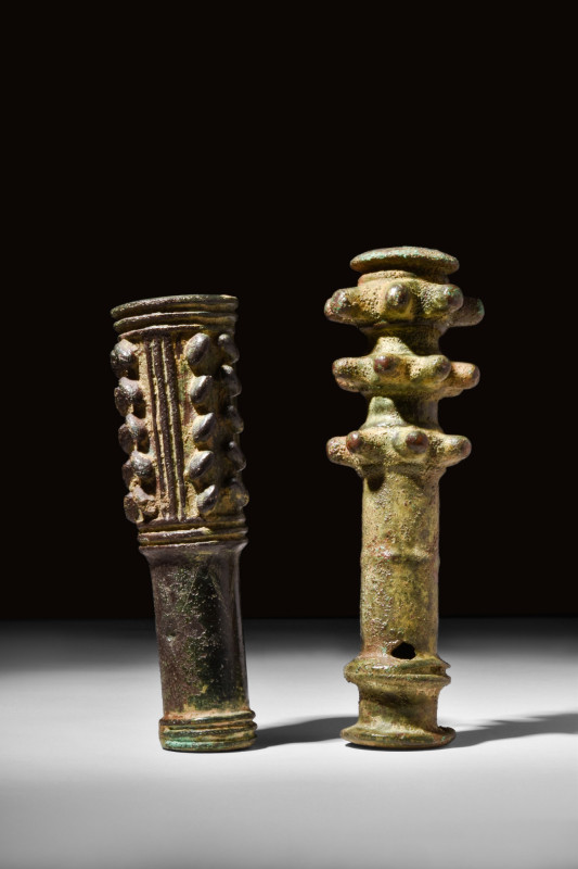 PAIR OF WESTERN ASIATIC BRONZE MACE HEADS

 Ca. 1200-700 BC
 A pair of cast b...