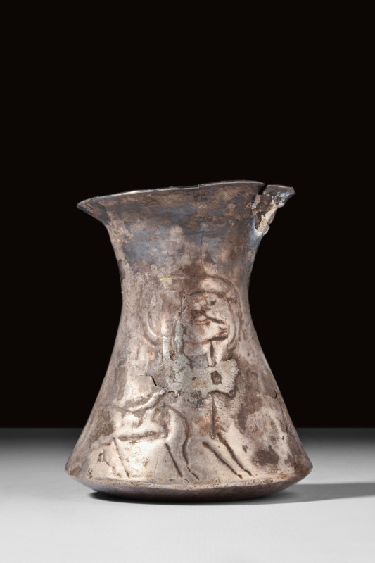 ANCIENT ELAMITE SILVER BEAKER WITH STAGS

 Ca. 2000 BC
 A finely crafted silv...