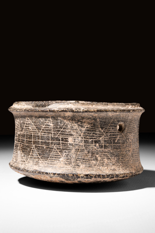 MESOPOTAMIAN STONE VESSEL

 Ca. 3rd-2nd millennium BC
 A stone vessel charact...