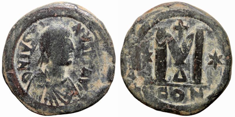 Justinian I, 527-565. Follis , Constantinople. DN IVSTINIANVS P P AVG Diademed, ...