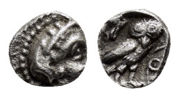 ATTICA. Athens.(Circa 454-404 BC). Hemiobol.

Obv : Helmeted head of Athena right.

Rev : AΘΕ.
Owl standing right, head facing; olive sprig to left; a...