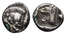 MYSIA.Cyzicus.(Circa 5th century BC).Obol.

Obv : Forepart of boar left; tunny to right.

Rev : Head of lion to left within incuse square, above flora...