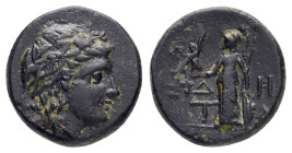 AEOLIS. Temnos.(2nd-1st centuries BC).Ae.

Obv : Wreathed head of Dionysos right.

Rev : Δ - H / T - A.
Athena standing left with Nike and spear; shie...