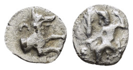 LYCAONIA.Laranda.(Circa 324-323 BC).Obol.

Obv : Baaltars seated left, holding grain ear, bunch of grapes, and scepter.

Rev : Forepart of wolf right;...