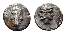 CILICIA. .Uncertain (BC 4th cent).Hemiobol.

Obv : Janiform head, male on left, female on right.

Rev : Three faced bearded head.
SNG Levante 203; SNG...