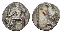 CILICIA. Uncertain.(4th century BC). Obol.

Obv : Baaltars seated left, holding grain ear, grapes and sceptre.

Rev : Eagle standing left on Plow.
SNG...