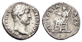 HADRIAN (117-138).Rome.Denarius. 

Obv : HADRIANVS AVG COS III P P.
Bare head right.

Rev : VICTORIA AVG.
Victory seated left on throne, holding wreat...