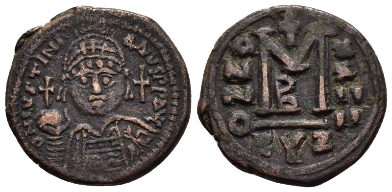 JUSTINIAN I (527-565). Cyzicus.Follis.

Obv : D N IVSTINIANVS P P AVG.
Helmeted ...