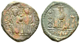 JUSTIN II with SOPHIA.(565-578).Antioch.Follis.

Obv : D N IVSTINOS ΔIΔ Ν.
Justin and Sophia seated facing on double throne, holding globus cruciger a...