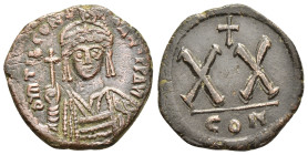 TIBERIUS II CONSTANTINE (578-582).Constantinople.Half Follis or 20 Nummi. 

Obv : D M TIB CONSANT P P AVG.
Helmeted, draped and cuirassed bust facing,...