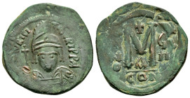 MAURICE TIBERIUS (582-602).Constantinople.Follis.

Obv : D N MAVRIC TIЬЄR P P AVG.
Helmeted and cuirassed bust facing, holding globus cruciger.

Rev :...