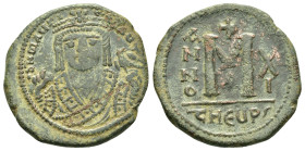 MAURICE TIBERIUS.(582-602).Antioch.Follis.

Obv : D N MAURI C N P AVT.
Crowned facing bust, wearing consular robes, holding mappa and eagle-tipped sce...