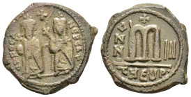 PHOCAS with LEONTIA (602-610).Theoupolis (Antioch).Follis.

Obv : D N FOCA NЄ PЄ AV.
Phocas, holding globus cruciger, and Leontia, holding cruciform s...