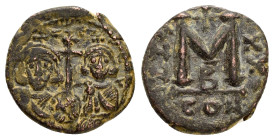 JUSTINIAN II and TIBERIUS (705-711).Constantinople.Follis. 

Obv : d N IYSTINIANYS ET TIbERIYS P.
Crowned and draped facing busts of Justinian and Tib...