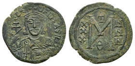 THEOPHILUS.(829-842).Constantinople.Follis.

Obv : ✷ • ΘЄO-FIL' ЬASIL.
Crowned and draped bust facing, holding patriarchal cross and akakia.

Rev : La...