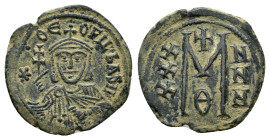 THEOPHILUS.(829-842).Constantinople.Follis.

Obv : ✷ • ΘЄO-FIL' ЬASIL.
Crowned and draped bust facing, holding patriarchal cross and akakia.

Rev : La...