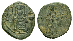 JOHN II COMNENUS (1118-1143). Thessalonica. Half Tetarteron.

Obv : IC - XC.
Christ standing facing on footstool, holding book of Gospels.

Rev : + IW...