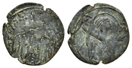 MICHAEL VIII PALAEOLOGUS (1261-1282).Constantinople. Ae Trachy. 

Condition : Good very fine.

Weight : 1.01 gr
Diameter : 17 mm