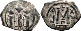 ARAB-BYZANTINE: Three Standing Figures. AE Fals; ARAB-BYZANTINE: Three Standing Figures; 640-650 AD. Cyprus, Fals, 5.19g. A-3561. derived from the yea...