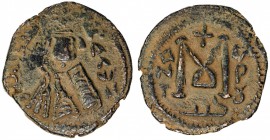 ARAB-BYZANTINE: Imperial Bust, ca. 680-692, AE fals (3.50g), Tardus (Antardus), ND, A-3525, mint name in Arabic left, KAΛΩN right // capital M, flanke...