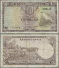 Zambia: Bank of Zambia, 10 Shillings ND(1964), P.1, stained paper with several folds, Condition: F.
 [differenzbesteuert]
