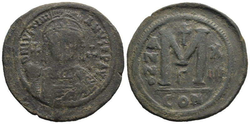 JUSTINIAN I (527-565). Follis. Constantinople. 
.
Condition: Very fine.
Weight: ...