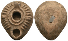 ANCIENT ROMAN COOKED EARTH OIL LAMP.
.
Weight: 55.51 g.
Diameter: 74 mm