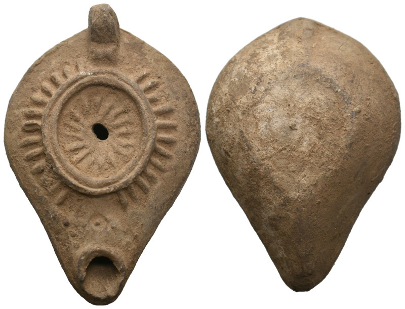 ANCIENT ROMAN COOKED EARTH OIL LAMP.
.
Weight: 76.14 g.
Diameter: 92.3 mm