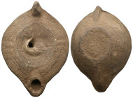 ANCIENT ROMAN COOKED EARTH OIL LAMP.
.
Weight: 91.70 g.
Diameter: 103.8 mm