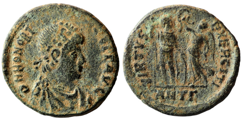 Honorius. (393-395 AD). Follis. (19mm, 3,00g) Antioch. Obv: DN HONORIVS PF AVG. ...