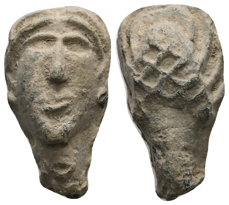 PB Greek female head (c. 6th–5th centuries BC)
lead female head, wearing ear-rin...