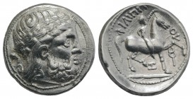 Celtic, Eastern Europe, imitating Philip II of Macedon, c. 3rd century BC. AR Tetradrachm (26mm, 12.80g, 3h). Laureate head of Zeus r. R/ Youth on hor...