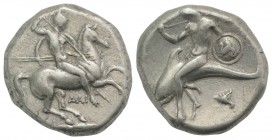Southern Apulia, Tarentum, c. 302-290 BC. AR Nomos (20mm, 7.90g, 9h). Warrior, holding shield and two spears, preparing to cast a third, on horseback ...