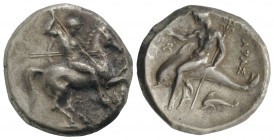 Southern Apulia, Tarentum, c. 315-302 BC. AR Nomos (21mm, 7.57g, 9h). Warrior, holding shield and two spears, preparing to cast a third, on horseback ...