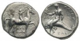 Southern Apulia, Tarentum, c. 302-280 BC. AR Nomos (21mm, 7.57g, 3h). Youth on horseback r., crowning horse; ΣA to l., APE/ΘΩN in two lines below. R/ ...