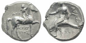 Southern Apulia, Tarentum, c. 302-280 BC. AR Nomos (19.5mm, 7.88g, 5h). Youth on horseback r., crowning horse; AΓΩ to l., KPAT/INOΣ below. R/ Phalanth...