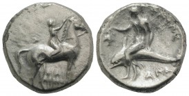 Southern Apulia, Tarentum, c. 302-280 BC. AR Nomos (21mm, 7.70g, 12h). Youth on horseback r., crowning horse with wreath; ΣA to l., ΦIΛI/APXOΣ in two ...