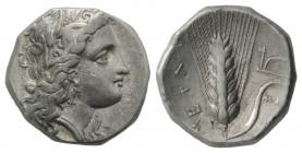 Southern Lucania, Metapontion, c. 325-275 BC. AR Stater (20mm, 6.74g, 1h). Head of Demeter r., wearing grain-ear wreath and earring. R/ Barley ear, le...