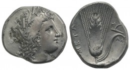 Southern Lucania, Metapontion, c. 325-275 BC. AR Stater (23mm, 7.82g, 3h). Head of Demeter r., wearing grain-ear wreath and earring. R/ Barley ear, le...