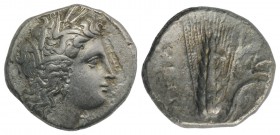 Southern Lucania, Metapontion, c. 325-275 BC. AR Stater (22mm, 7.38g, 6h). Head of Demeter r., wearing grain-ear wreath and earring. R/ Barley ear, le...