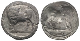 Southern Lucania, Sybaris, c. 550-510 BC. AR Stater (29mm, 7.85g, 12h). Bull standing l. on dotted exergual line, looking back. R/ Incuse bull standin...