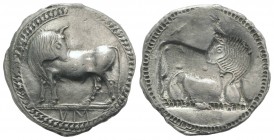 Southern Lucania, Sybaris, c. 550-510 BC. AR Stater (29.5mm, 8.20g, 12h). Bull standing l. on dotted exergual line, looking back. R/ Incuse bull stand...