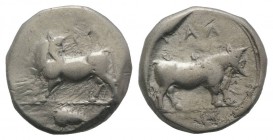 Bruttium, Laos, c. 480-460 BC. AR Stater (19mm, 7.96g, 3h). Man headed bull l., head reverted; acorn in exergue. R/ Man headed bull standing r. HNItal...