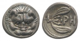 Bruttium, Rhegion, c. 415/0-387 BC. AR Litra (9mm, 0.78g, 9h). Facing lion’s head. R/ PH within olive sprig. HNItaly 2499; SNG ANS 670-4. Toned, EF